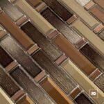 Malla decorativa de vidrio gin 30 x 33 4 cm-tiles-2-ok | Plomería García Close-up of diagonal brown and beige mosaic tiles with alternating rectangular and thin strips.